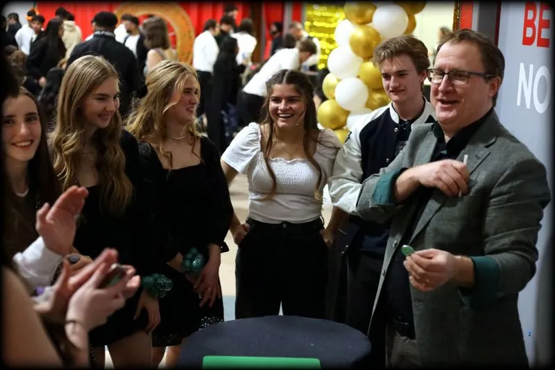 Comedy magician Clinton W. Gray performs closeup magic