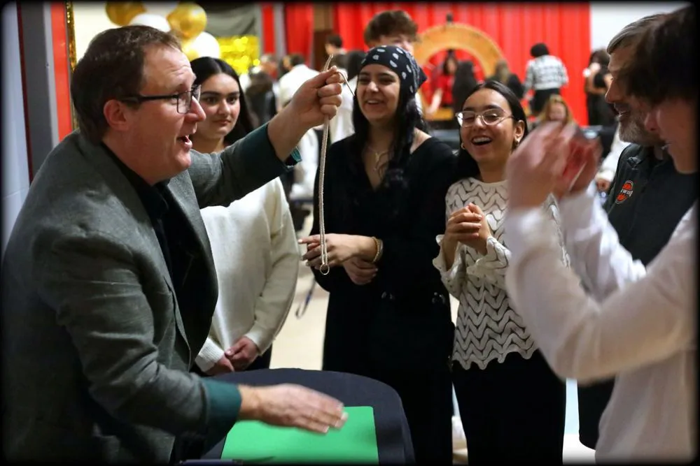 Comedy magician Clinton W. Gray performs closeup magic